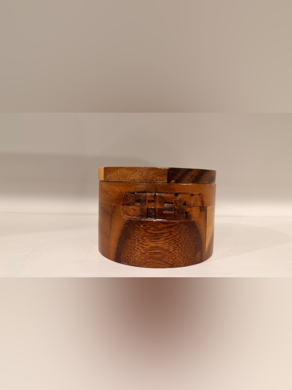 Carved Wooden Round Trinket Box in Warm Brown with Tea Carved into It